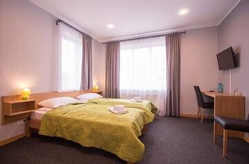 Фото номера Двухместный номер с 1 кроватью или 2 отдельными кроватями Отель Villa Vanilla г. Сигулда 4