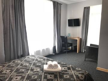 Фото номера Двухместный номер с 1 кроватью и балконом Отель Villa Vanilla г. Сигулда 5