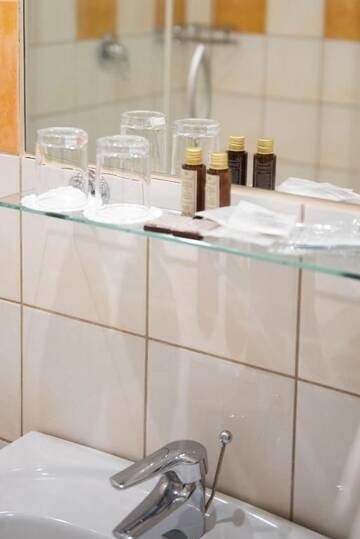 Фото номера Улучшенный двухместный номер с 1 кроватью Отель Hotel Sigulda г. Сигулда 3
