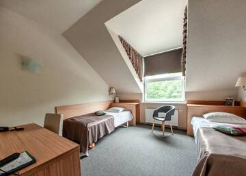 Фото номера Двухместный номер с 2 отдельными кроватями Отель Hotel Sigulda г. Сигулда 2