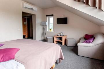 Фото номера Улучшенный двухместный номер с 1 кроватью Отель Hotel Sigulda г. Сигулда 2