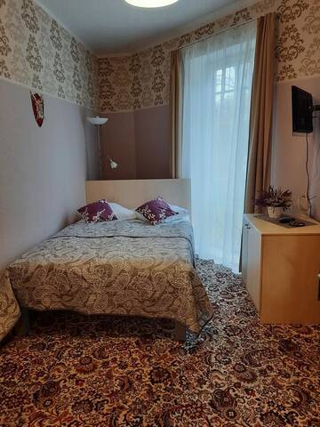 Фото номера Двухместный номер эконом-класса с 1 кроватью Отель Hotel Pils with Self-Check in г. Сигулда 2