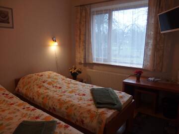 Фото номера Двухместный номер с 2 отдельными кроватями Гостевой дом Parks Guest House г. Сигулда 4