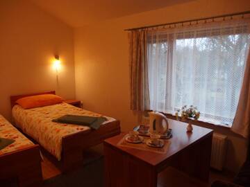 Фото номера Двухместный номер с 2 отдельными кроватями Гостевой дом Parks Guest House г. Сигулда 6