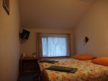 Фото номера Двухместный номер с 2 отдельными кроватями Гостевой дом Parks Guest House г. Сигулда 7