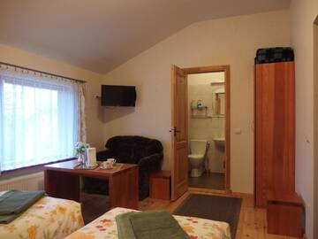 Фото номера Двухместный номер с 2 отдельными кроватями Гостевой дом Parks Guest House г. Сигулда 12